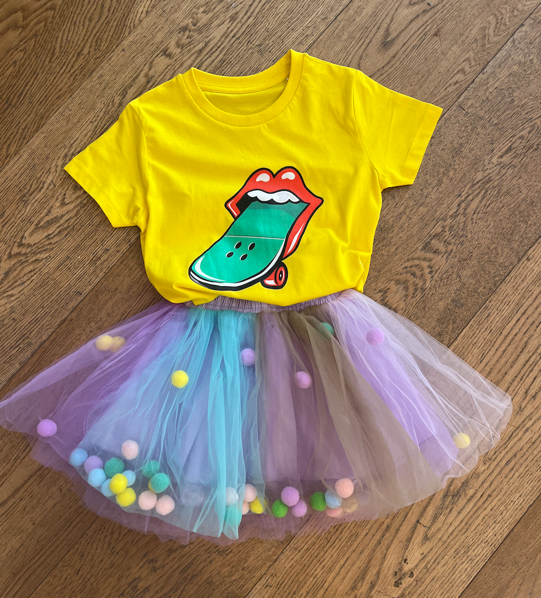 Elevate your child's style with the Kids Multicolored Pom Pom Tutu by Rock My Baby!