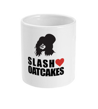 Load image into Gallery viewer, Introducing the &quot;Slash Loves Oatcakes Mug&quot; – the perfect companion for your daily brew and oatcake indulgence.

